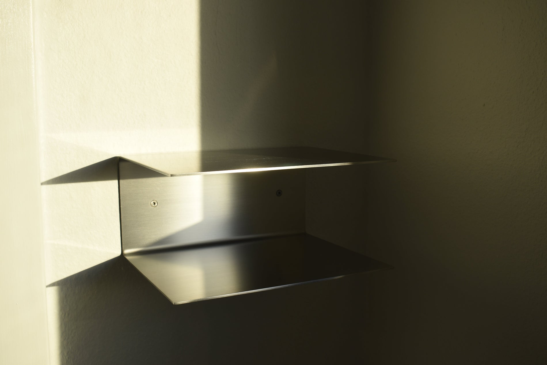 Lund - Wall-mounted stainless steel bedside table